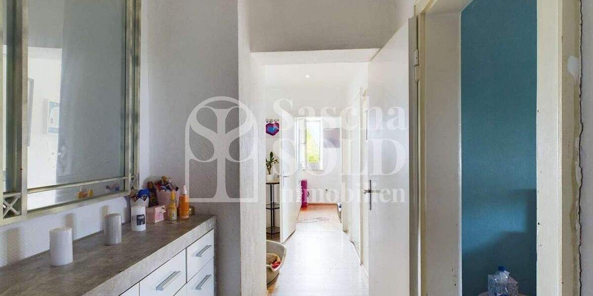 Wohn- und Geschäftshaus in St. Ingbert - für Investoren - mit Wohnung, Gewerbe, Garten und Garagen - Reihenendhaus Sankt Ingbert St. Ingbert | Angebot:23973449