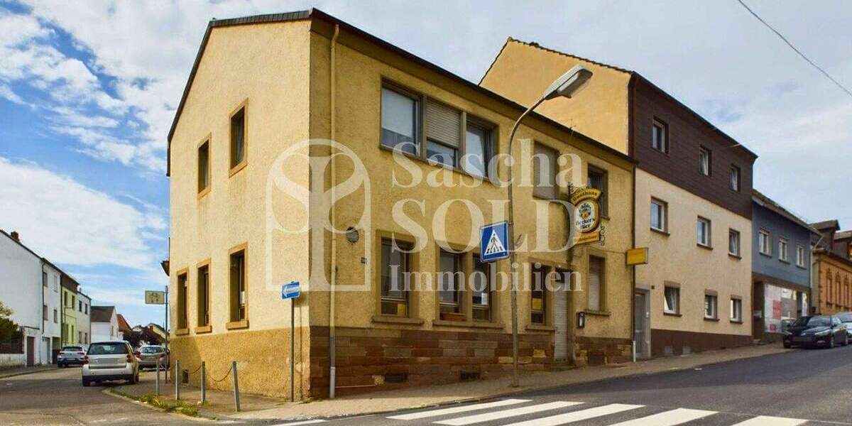 Wohn- und Geschäftshaus in St. Ingbert - für Investoren - mit Wohnung, Gewerbe, Garten und Garagen - Reihenendhaus Sankt Ingbert St. Ingbert | Angebot:23973449