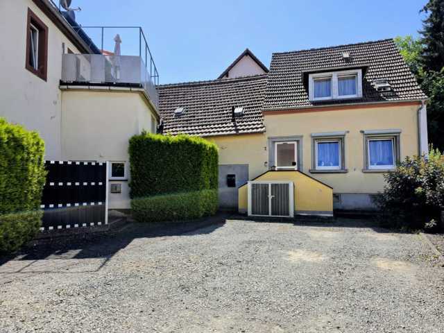2-Familienhaus mit attraktiver Gewerbefläche in prominenter Lage - Mehrfamilienhaus, Wohnhaus Homburg | Angebot:27003328