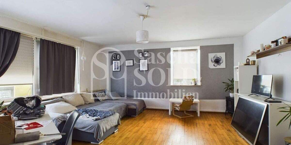 Wohn- und Geschäftshaus in St. Ingbert - für Investoren - mit Wohnung, Gewerbe, Garten und Garagen - Reihenendhaus Sankt Ingbert St. Ingbert | Angebot:23973449