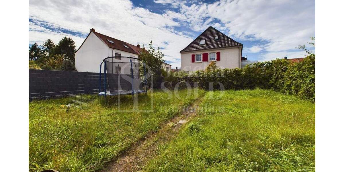 Wohn- und Geschäftshaus in St. Ingbert - für Investoren - mit Wohnung, Gewerbe, Garten und Garagen - Reihenendhaus Sankt Ingbert St. Ingbert | Angebot:23973449