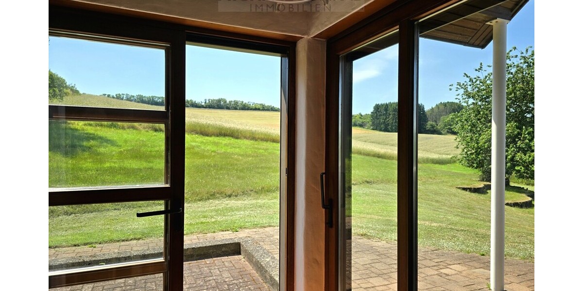 Natur pur! Außergewöhnliches Architektenhaus in traumhafter Lage und mit Einliegerwohnung - Einfamilienhaus Schmelz | Angebot:27355602